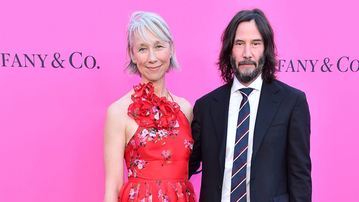 Keanu Reeves and Alexandra Grant on the red carpet